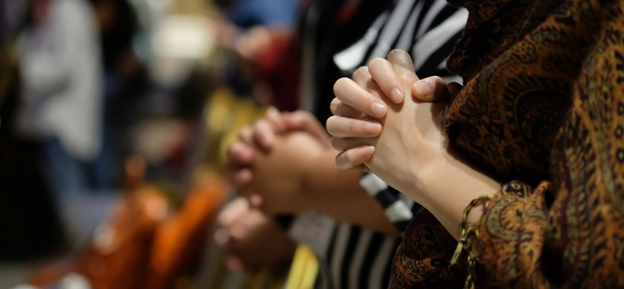 praying hands at church for colorado prays