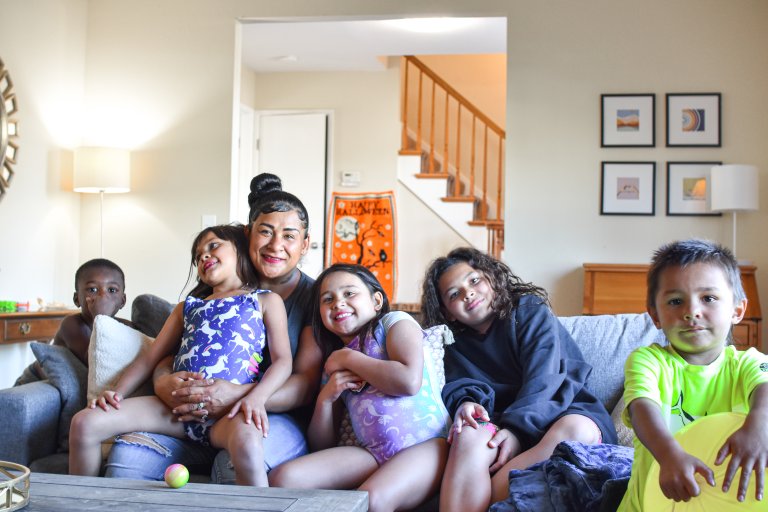 from unhoused to housed family in new house