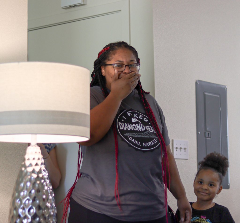 from unhoused to housed mom and daughter entering new house